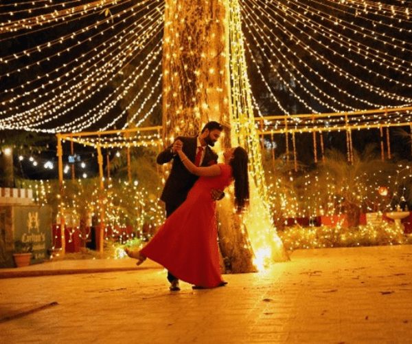 Celebration under decorative lights at The Carlton Hotel