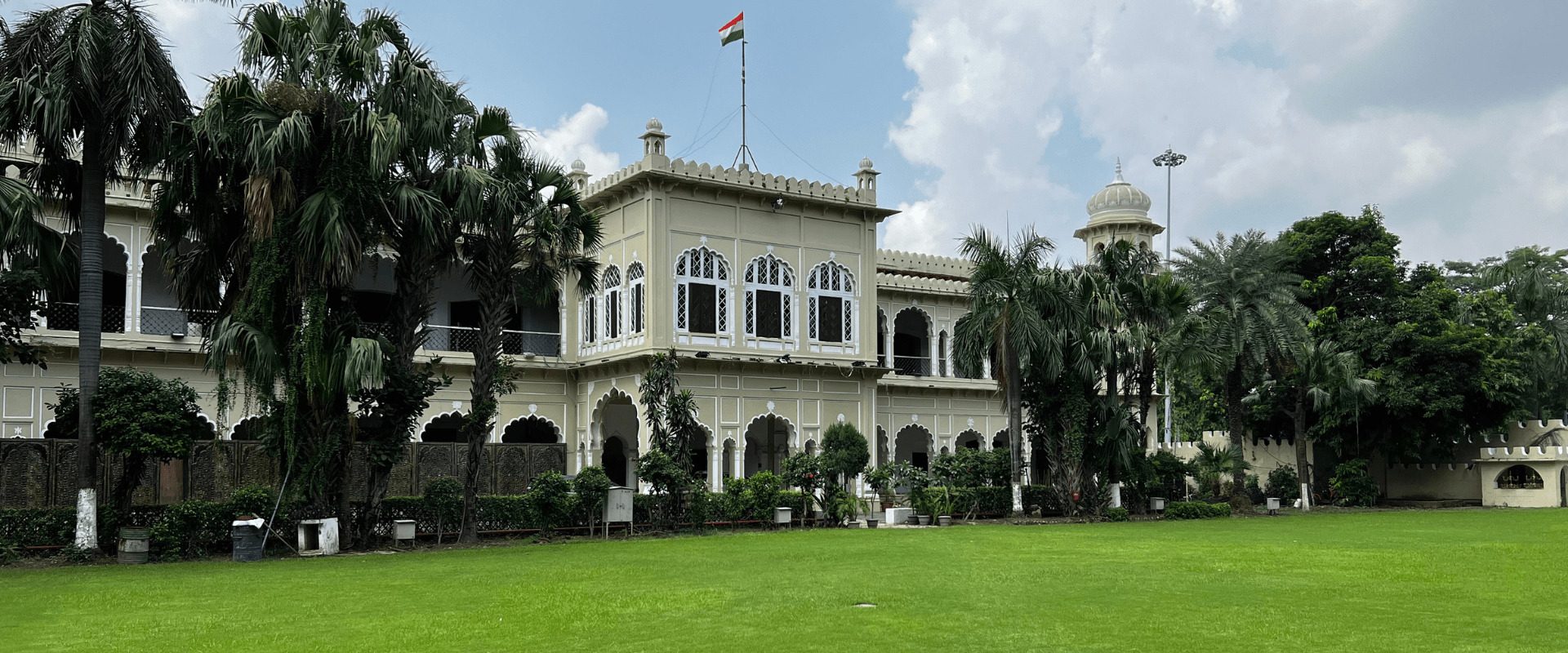 The Carlton Hotel heritage building and lawn in Lucknow